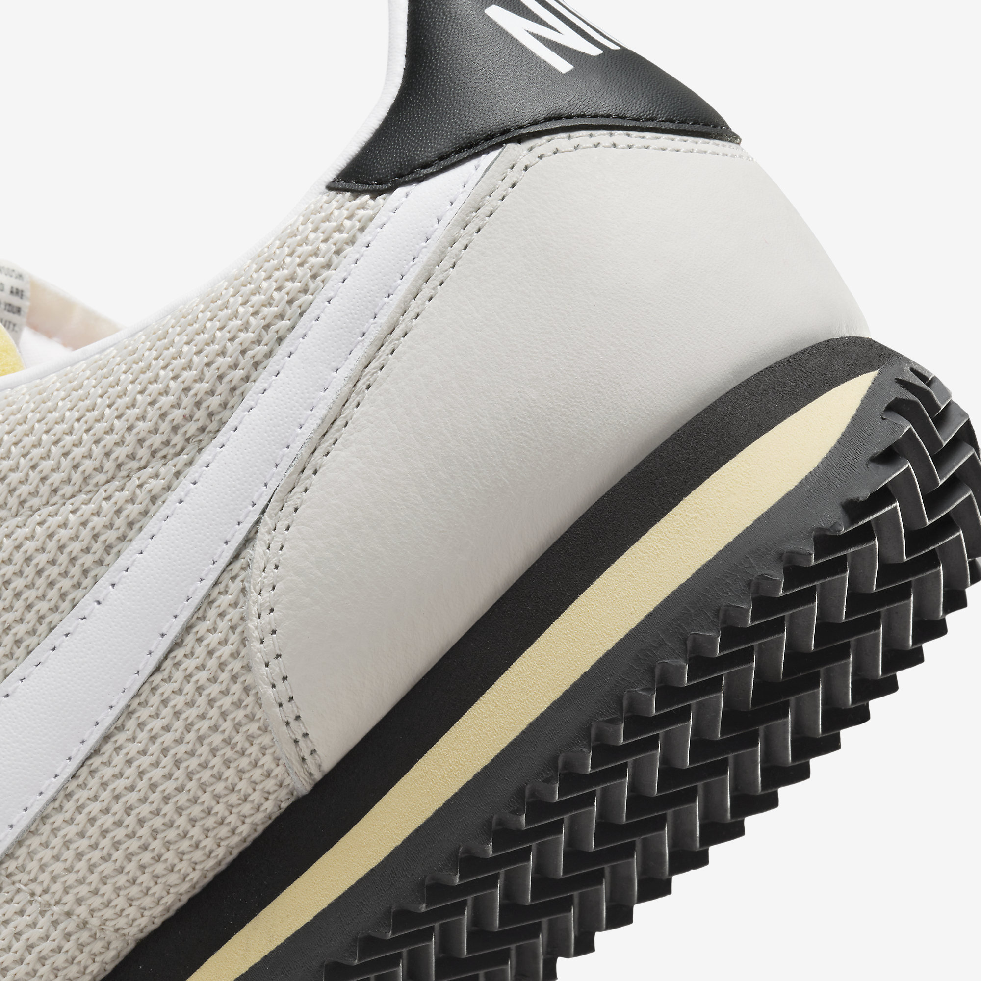 nike classic cortez off white